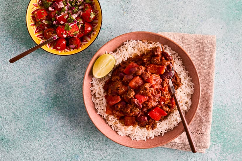 Everyone needs a definitive chilli recipe up their sleeve, and this is yours. It contains all the usual suspects, including beef mince, a chilli spice blend, kidney beans, tomatoes and a bed of fluffy basmati rice, plus a chunky baby tomato, red onion and coriander salsa to take it to the next level.
