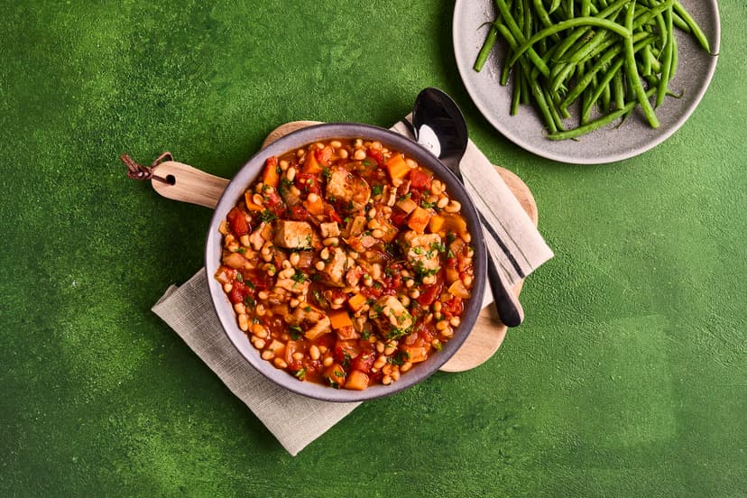 Originating in the south of France, this dish is rich, rustic and extremely satisfying. Lean pork loin is simmered with bacon, onion, tomatoes and haricot beans in a thyme-scented sauce, and served simply with green beans. An instant classic!